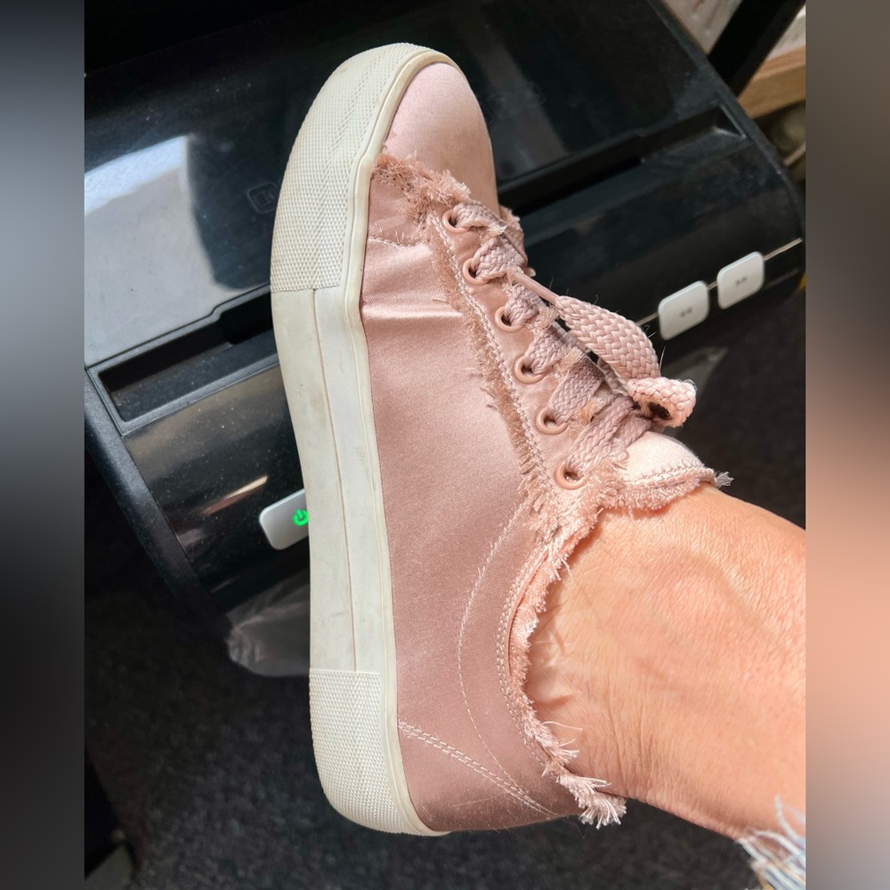 Steve Madden woman’s pink satin sneaker type shoes.